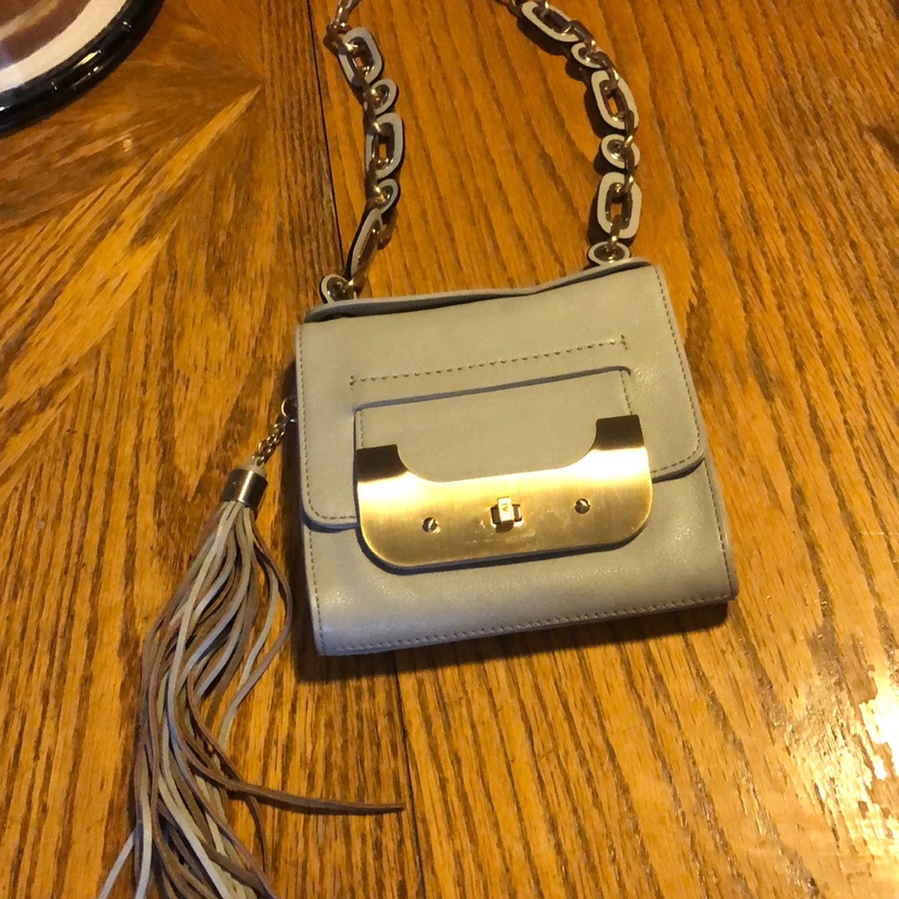 Gray DVF shoulder bag.